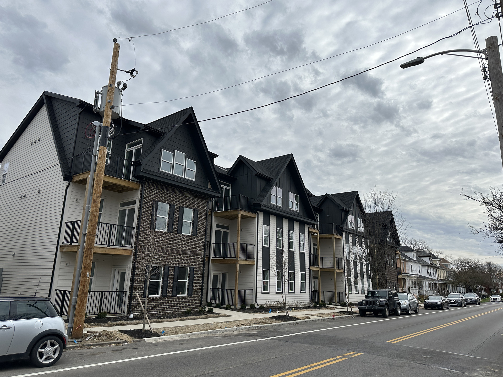 Exterior rendering of Dora Lofts townhome-style building