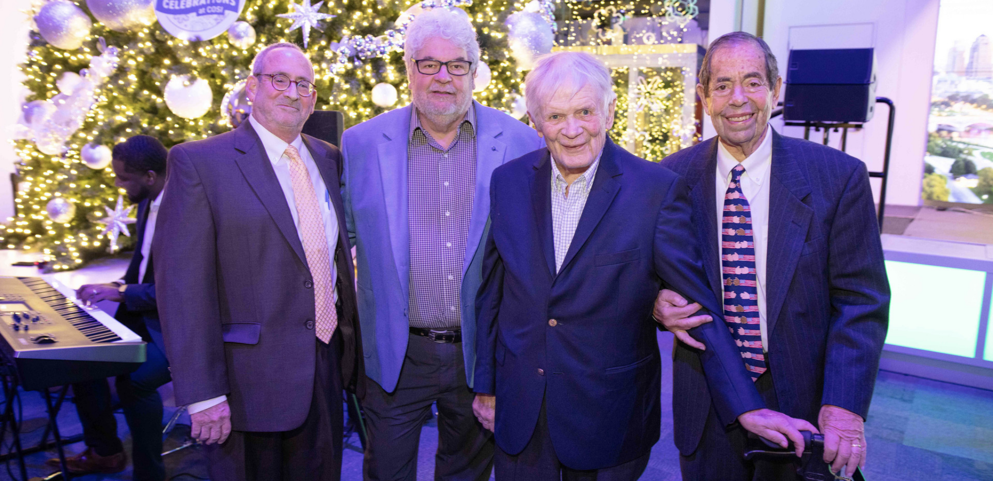 Hal Keller, Bill Faith, Don Shackelford, and Bob Weiler at a holiday gathering